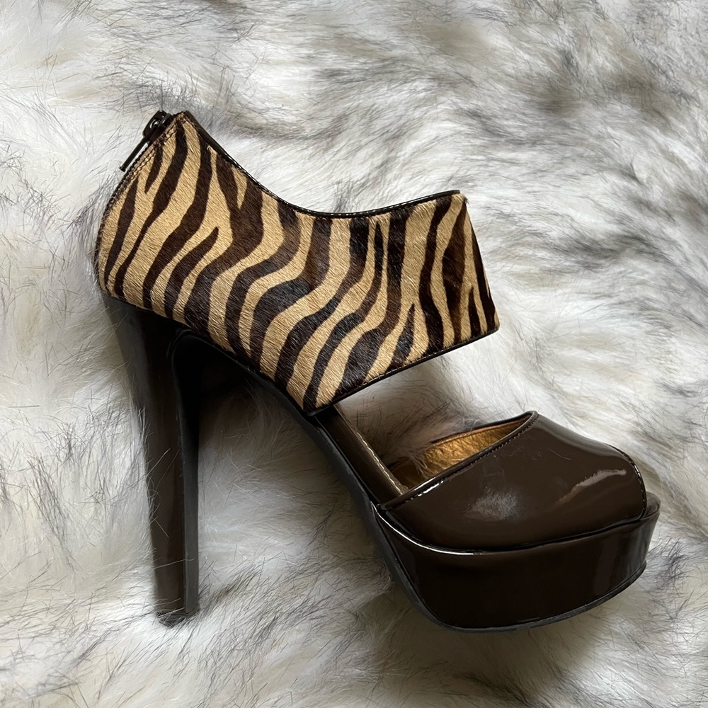 New BCBG Helanra tiger pattern calf hair cuff platforms with 5inch heels.